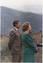 Thatcher with US President George H. W. Bush on the day of the invasion of Kuwait in 1990 President George H. W. Bush and Prime Minister Margaret Thatcher addresses the Aspen Institute Symposium.jpg