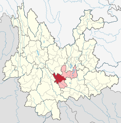 Location of Xinping County (red) and Yuxi City (pink) within Yunnan