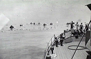 Survivors about to be rescued by HMAS Bendigo