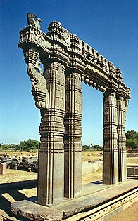 Kakatiya Kala Thoranam (Warangal Gate) built by the Kakatiya dynasty in ruins; one of the many temple complexes destroyed by the Delhi Sultanate.[153]