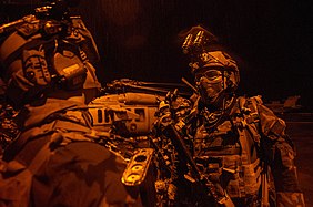 SEALs prepare for a training mission aboard the USS George Washington.