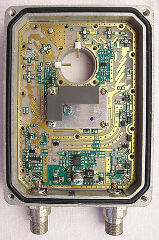 <span class="mw-page-title-main">Low-noise block downconverter</span> Receiving device on satellite dishes