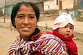 Image 30Amerindian woman with child (from Demographics of Peru)