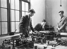 Museum of Transport & Technology's Meccano differential analyser in use at the Cambridge University Mathematics Laboratory, c. 1937. The person on the right is Dr. Maurice Wilkes, who was in charge of it at the time DA Cambridge c1937.jpg