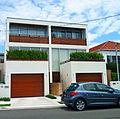 Cement rendered pavilion style semi-detached houses in Dover Heights