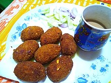 Photographie de boulettes recouvertes de chapelure.