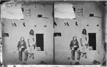 The man seated left is a Zuni with albinism. The Zuni people and other indigenous tribes of the American Southwest have a very high incidence of albinism.[33]