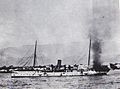 Crête-à-Pierrot with a large cloud of black smoke rising from the rear of the vessel