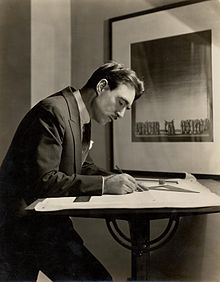 Early stagecraft master Robert Edmond Jones drawing at a high table (c. 1920). Robert Edmond Jones.jpg