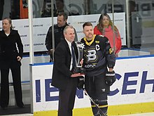 The H Newman Reid Trophy being presented to 2022 winners CBR Brave BraveHNRTrophy2022.jpg