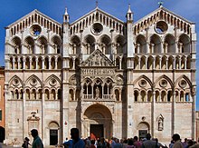 Facade of Ferrara Cathedral, which had been completed ten years earlier. Cattedrale di San Giorgio a Ferrara.jpg