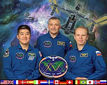 Original second portion of Expedition 15 crew portrait, from left to right: Daniel Tani, Yurchikhin, Kotov. Due to a change in schedule, Tani joined Expedition 16 in October 2007. Expedition 15 2.jpg