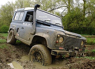 Off-roading driving or riding a vehicle on unsurfaced roads or tracks