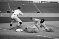 Image 21 Ty Cobb Photo: National Photo Company; restoration: Lise Broer; crop: jjron Ty Cobb (1886–1961), shown here sliding into third base on August 16, 1924, was an American Major League Baseball (MLB) outfielder. He spent twenty-two seasons with the Detroit Tigers, including six as the team's player-manager, and finished his career with the Philadelphia Athletics. During this time Cobb set ninety MLB records, though his abilities were sometimes overshadowed by his surly temperament and aggressive playing style. In 1936 Cobb was made an inaugural member of the Baseball Hall of Fame, and in 1999 editors at the Sporting News ranked him third on their list of "Baseball's 100 Greatest Players". More selected pictures