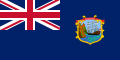 This was the 1874 flag of the Saint Helena at the time. The coat of arms can be extracted from this SVG vector image and placed into the pre-1999 Governor's flag template.