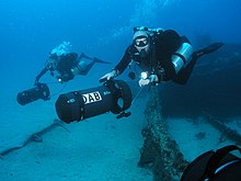 Two divers scootering with heavy duty DPVs Gavin scooter dab.jpg