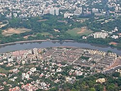 Aerial view of Nandanam, seen here to the north of the Adyar River and Kotturpuram to the south.