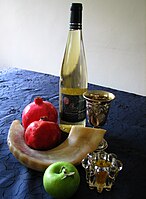 Traditional Rosh Hashanah foods: Apples and honey, pomegranates, wine for kiddush