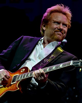 <span class="mw-page-title-main">Lee Roy Parnell</span> American country music and blues artist, singer, songwriter, and guitarist