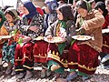 Girls enjoying a meal in Chaghcharan on Orphanage Day