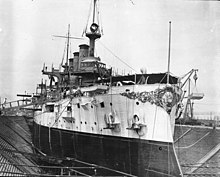 Connecticut in dry dock at the Brooklyn Naval Yard after the world cruise in March 1909 USS-Connecticut.jpg