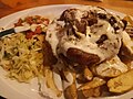 Image 60Pork chop with plantain chips. (from Honduran cuisine)