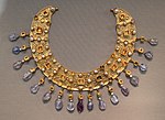 Collier; late 6th–7th century; gold, an emerald, a sapphire, amethysts and pearls; diameter: 23 cm (9.1 in); from a Constantinopolitan workshop; Antikensammlung Berlin (Berlin, Germany)[259]