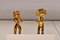 Gold figures, musician and dancer