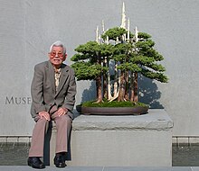 John Naka with his masterpiece Goshin at the United States National Arboretum Naka-with-goshin.jpg