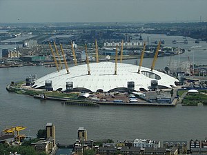 Photograph of a large white dome studded with pylons