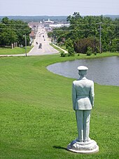 A statue of a soldier dating from RSU's time as Oklahoma Military Academy overlooks Claremore from the school's entrance. RSUsoldierstatue.JPG