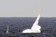 USS Florida launching a Tomahawk cruise missile