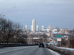 US 9 and 20 entering Rensselaer, with Albany's skyline looming across the Hudson River