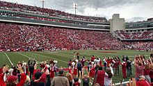 Madre Hill leads a hog call in Razorback Stadium Hog call.jpg