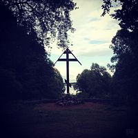 The memorial crucifix on the bank of Peryn