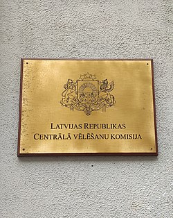 Plaque by the CVK office in Riga