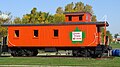 A restored GTW wood caboose on display at Lake Odessa, Michigan