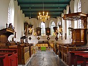 Interieur met rouwborden in het koor (2009)