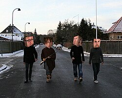 The members of Apparatjik as "Cubeheads"