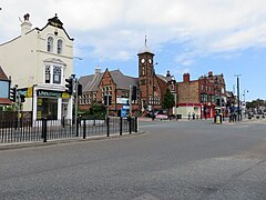 A suburban street with road traffic on