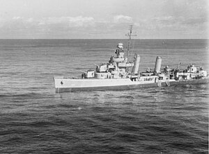 USS Corry (DD-463) with nets over her side, rescuing U-801's survivors, after the submarine had been sunk by aircraft and surface ships of the USS Block Island (CVE-21) group in position 16°41'N, 29°58'W, 17 March 1944.