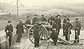 Union General William T. Sherman (standing with arm on the breech of the weapon) and staff.