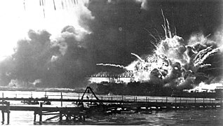 N 2004 20 Pearl Harbor -USS Shaw exploding (23429277352).jpg