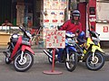 Image 25A ojek driver at the motorcycle taxi stand. (from Transport in Jakarta)