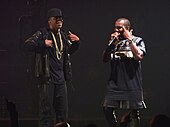 West and Jay-Z performing on the Watch the Throne Tour