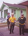 Musicians playing snare drum, trombone