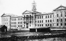 Sherman Hall under construction c. 1900. Sherman Hall.png