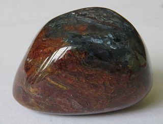 <span class="mw-page-title-main">Pietersite</span> Commercial term for a variety of chalcedony