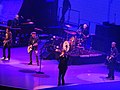 the band with Chuck Leavell on keyboards and Darryl Jones on bass, concert in Boston, 2013