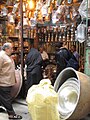 A copperware seller in Tehran Grand Bazar